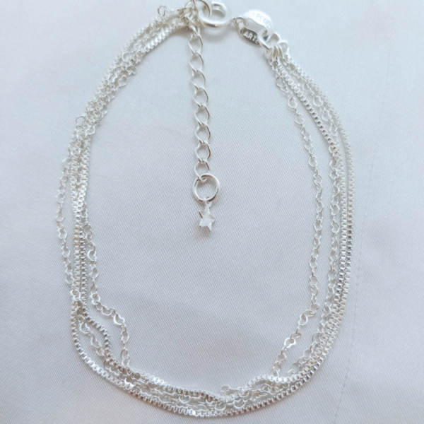 Pulsera Plata en Triple