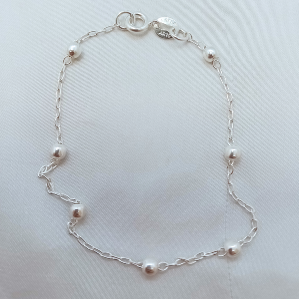 Pulsera con bolitas